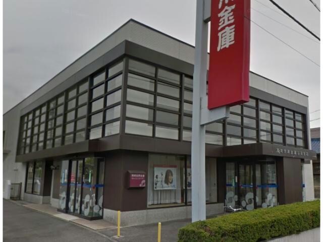 岡崎信用金庫高岡支店(銀行)まで871m サンシャインヒルズＭ　A棟