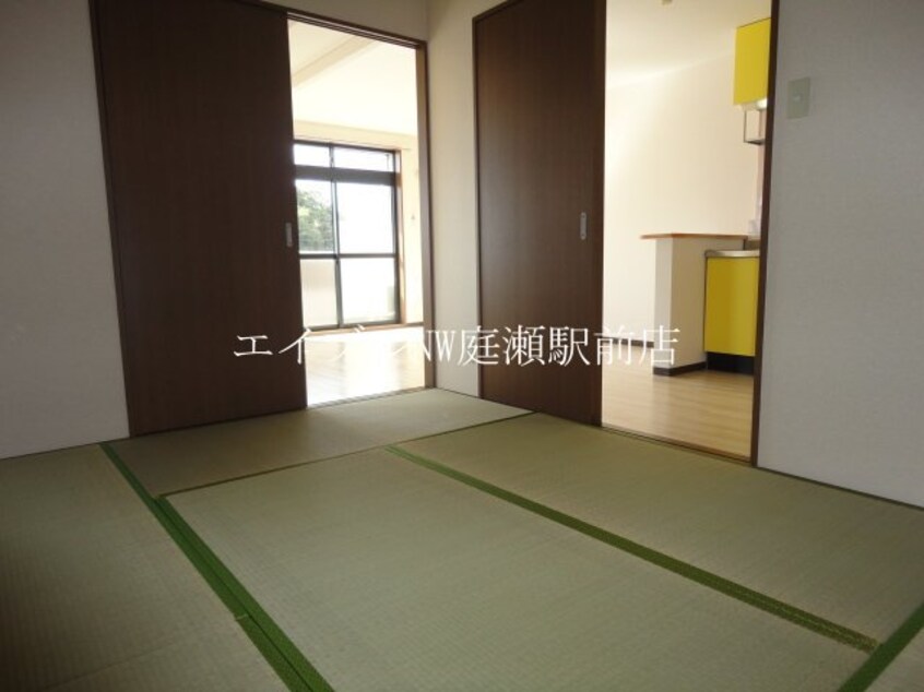 和室からリビング ロイヤルコーポ・サノ