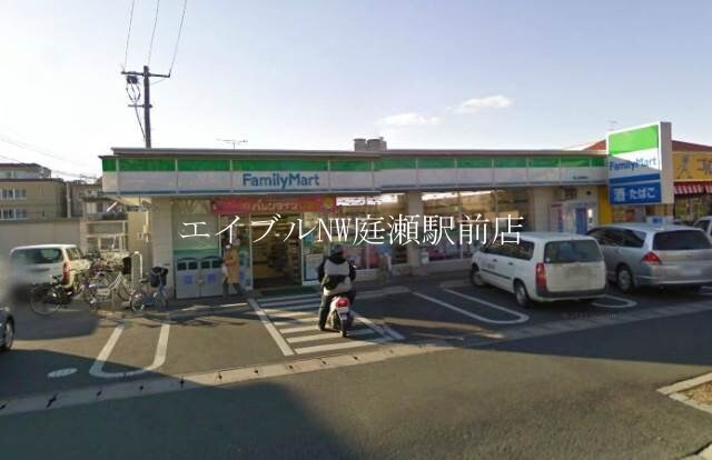 ファミリーマート岡山国富店(コンビニ)まで695m 住吉ビル