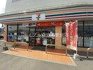 セブンイレブン総社岡谷店(コンビニ)まで900m ベル・コリーヌ　Ａ