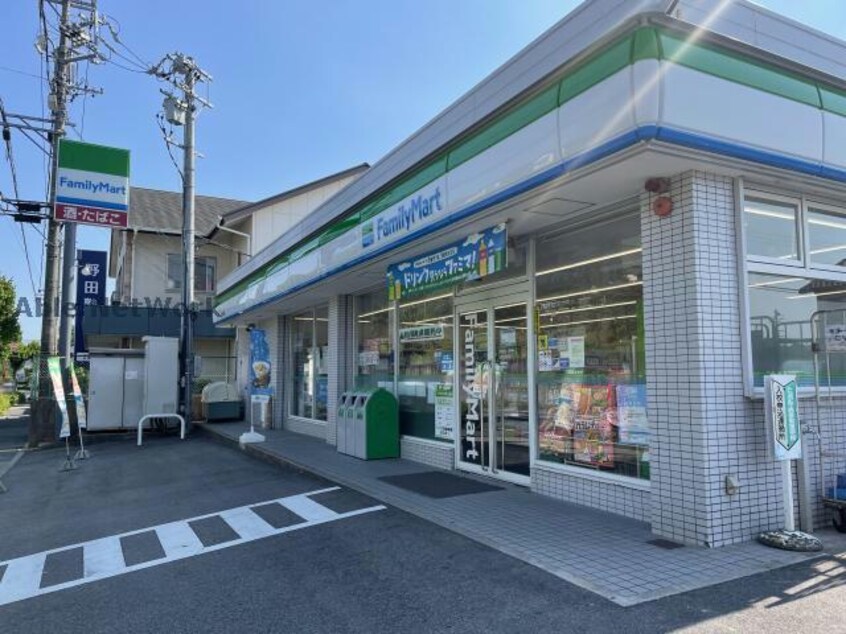 ファミリーマート三好丘桜店(コンビニ)まで1076m サン・ヒルズ C棟