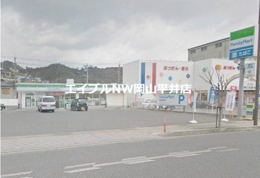 ファミリーマート玉野宇野店(コンビニ)まで748m 第６アルバマンション