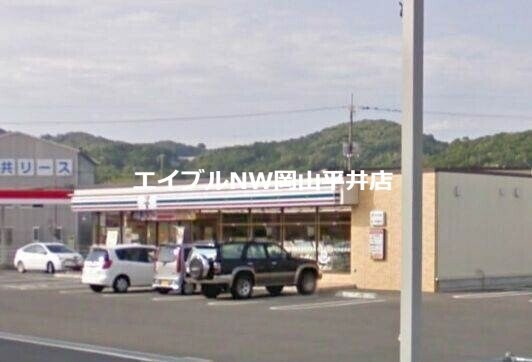 セブンイレブン岡山古都宿店(コンビニ)まで1107m フィオーレ・タチバナＣ