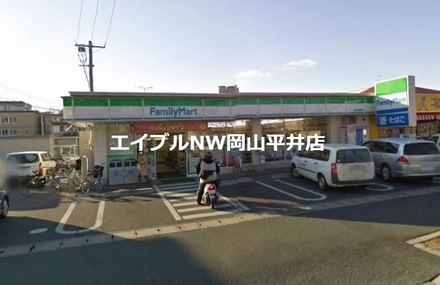 ファミリーマート岡山国富店(コンビニ)まで463m ウェーブレジデンス原尾島Ⅲ