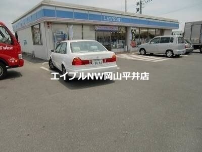 ローソン岡山倉富店(コンビニ)まで1152m シャーメゾン湊　十壱番館