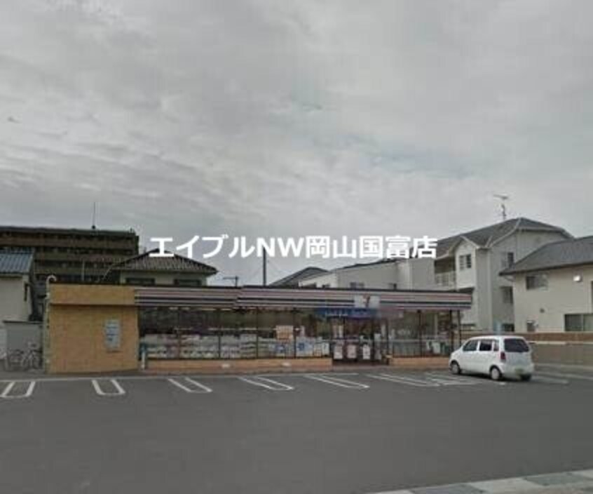 セブンイレブン岡山関店(コンビニ)まで408m カーサ・ヴィーノ　Ｂ