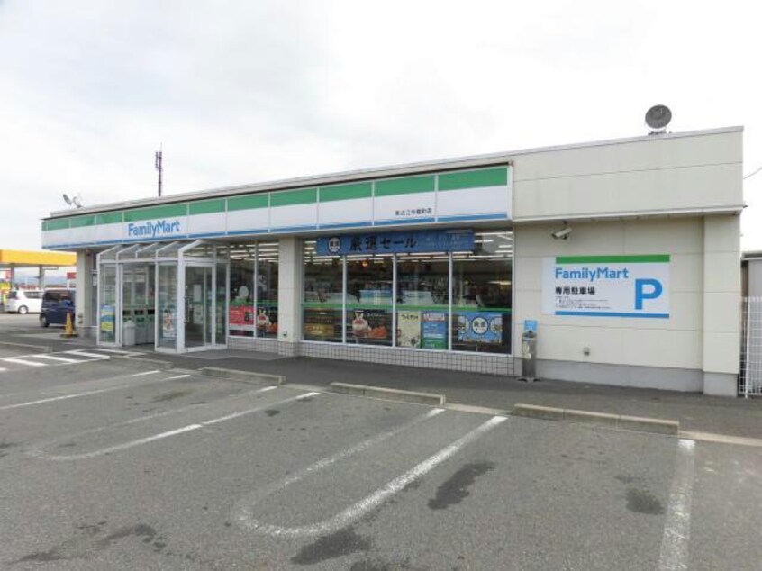 ファミリーマート東近江今堀町店(コンビニ)まで1456m Mフラット