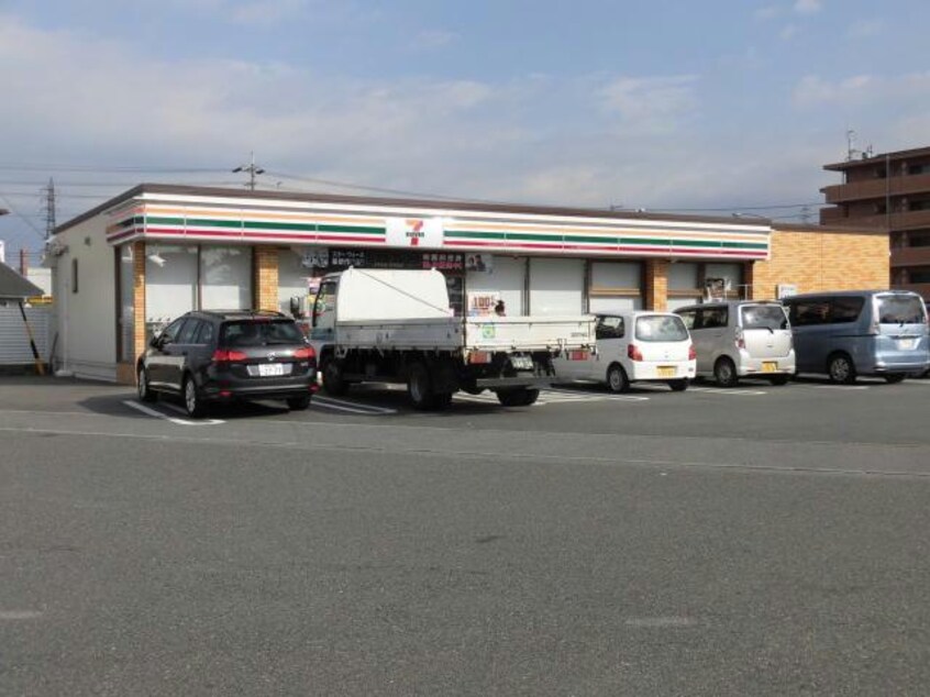 セブンイレブン八日市インター店(コンビニ)まで1062m パレ・シャルマン