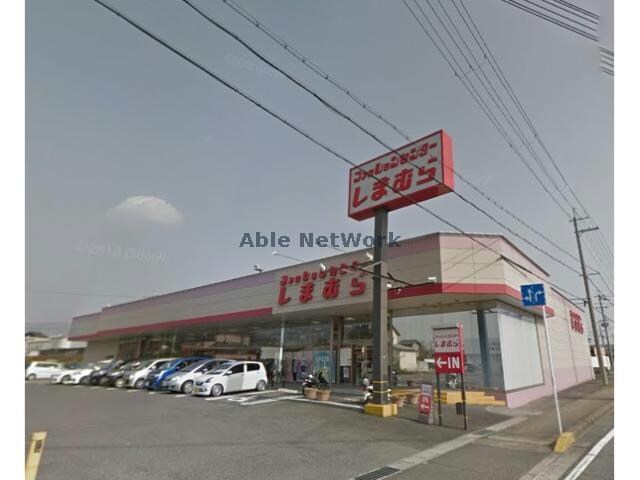 ファッションセンターしまむら日野店(ショッピングセンター/アウトレットモール)まで595m エステート近畿日野Ｂ