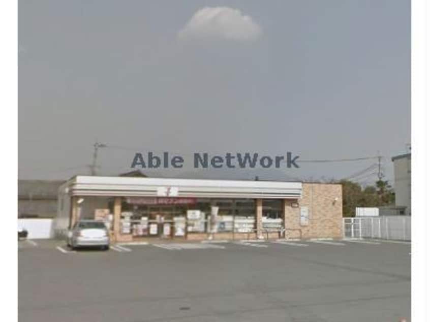 セブンイレブン滋賀日野高校前店(コンビニ)まで1043m ラ・ポルタ・グランデ