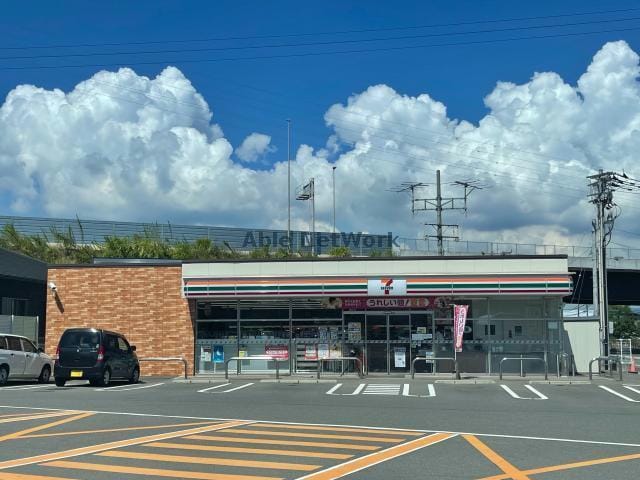 セブンイレブン諫早川床町店(コンビニ)まで877m プラシードヒル　Ⅹ