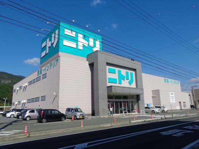 ニトリ大洲店(電気量販店/ホームセンター)まで723m 谷口マンション