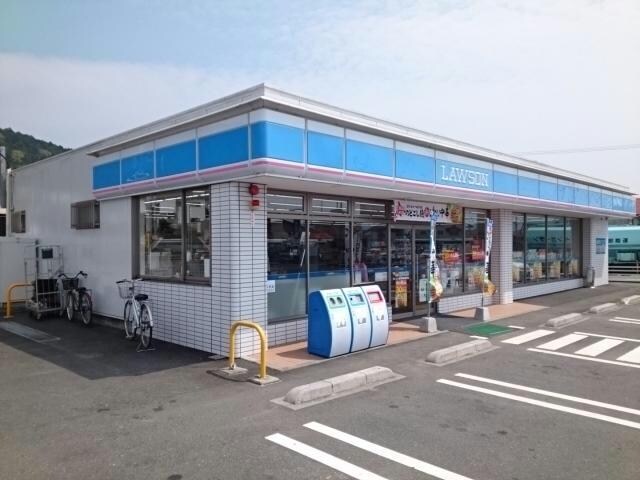 ローソン西予卯之町店(コンビニ)まで356m シャン・ド・フルール　K