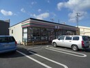 セブンイレブン甲南町新治店(コンビニ)まで400m エスポアールShinjiⅡ