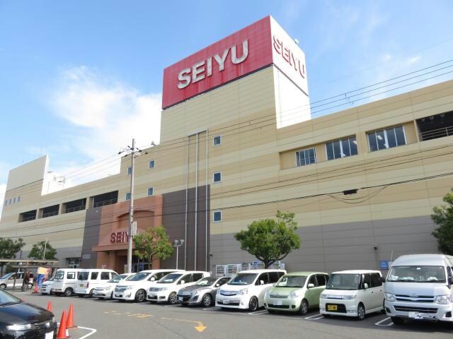 西友水口店(スーパー)まで596m 梅が丘マンション