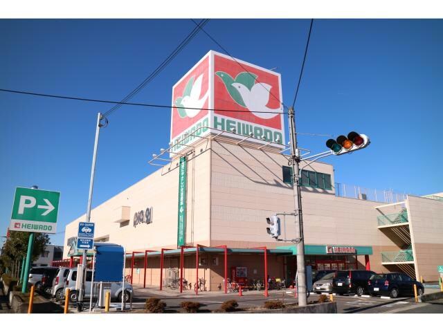 平和堂石部店(スーパー)まで1022m GRANDIR THREE ONE