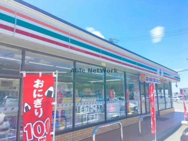 セブンイレブン新城富永南店(コンビニ)まで559m グレイスコート