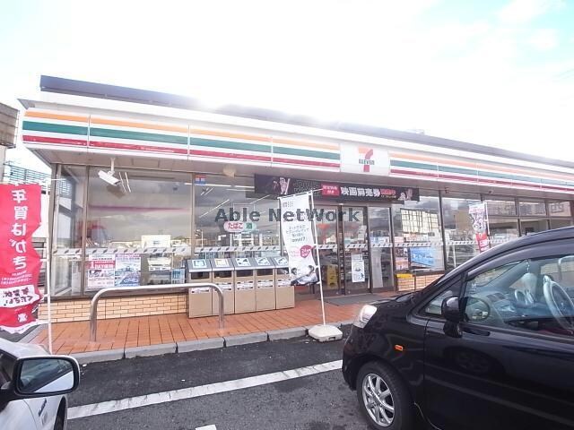 セブンイレブン養老町直江店(コンビニ)まで1629m ノーブルＦＵＪＩＩ　Ａ