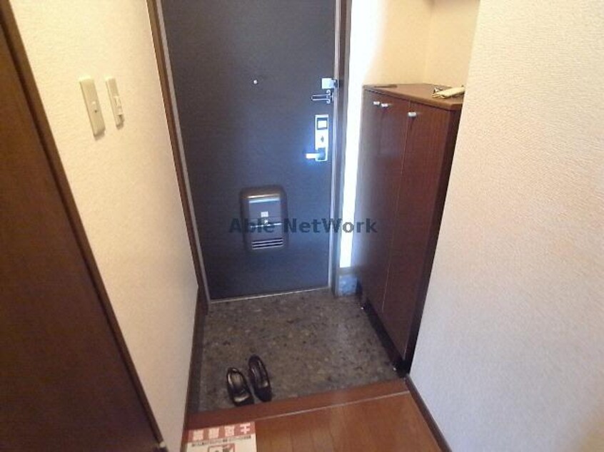 玄関 コミュニティ－タウンDX