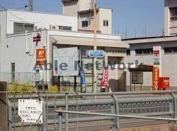 岐阜城南郵便局(郵便局)まで1010m エレガンスイシグレ