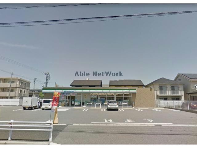 ファミリーマート刈谷半城土西店(コンビニ)まで556m パレスベル