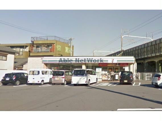 セブンイレブン知立谷田町店(コンビニ)まで758m リバーサイドエクセルK