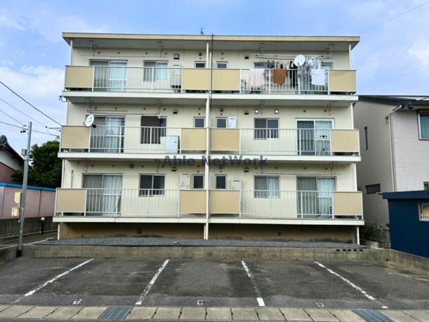 コーポ的場