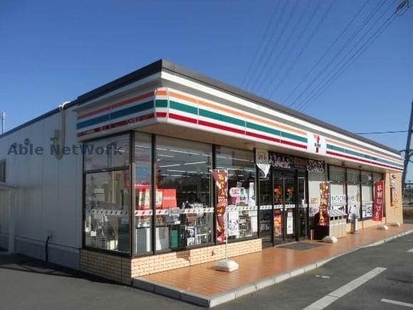 セブンイレブン古河日赤前店(コンビニ)まで455m トリニティーＢ
