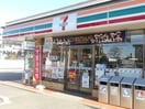 セブンイレブン古河新中田店(コンビニ)まで727m スパニッシュガーデンD