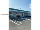 ファミリーマート小松島金磯店(コンビニ)まで613m ハーバービュー金磯C.D
