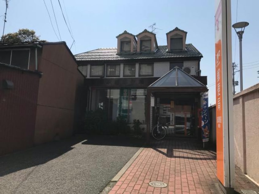 新津駅前郵便局(郵便局)まで970m グラン・ソレイユ　