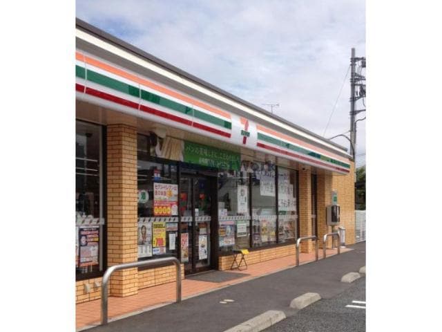 セブンイレブン江南御正新田店(コンビニ)まで1801m カズミハイツＢ（熊谷市村岡）