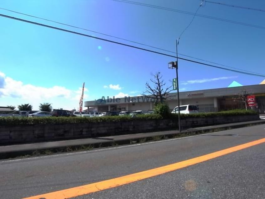 トミダヤ本巣店(スーパー)まで1328m デ・アコールド