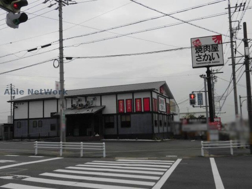 炭火焼肉屋さかい小牧北外山店(その他飲食（ファミレスなど）)まで1016m ＲＩＯ　ＬＡＤＯ