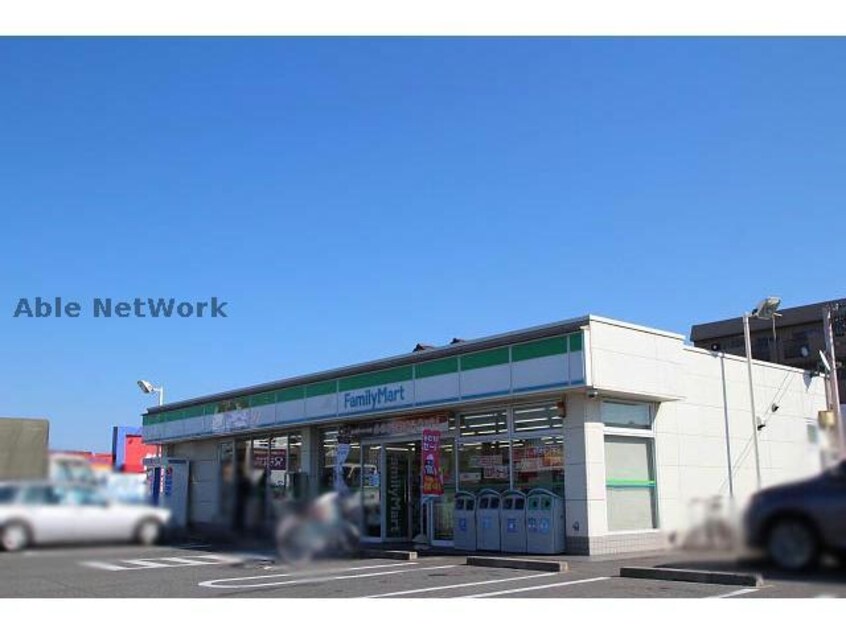 ファミリーマート小牧パワーズ店(コンビニ)まで609m アルフェラッツ城北