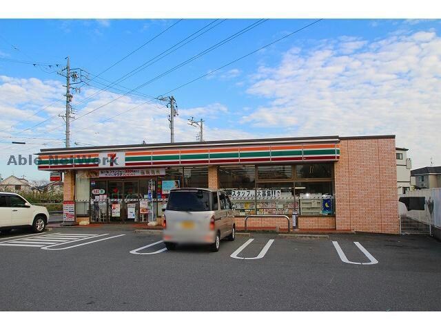 セブンイレブン小牧久保一色店(コンビニ)まで725m サニーテラスⅠ