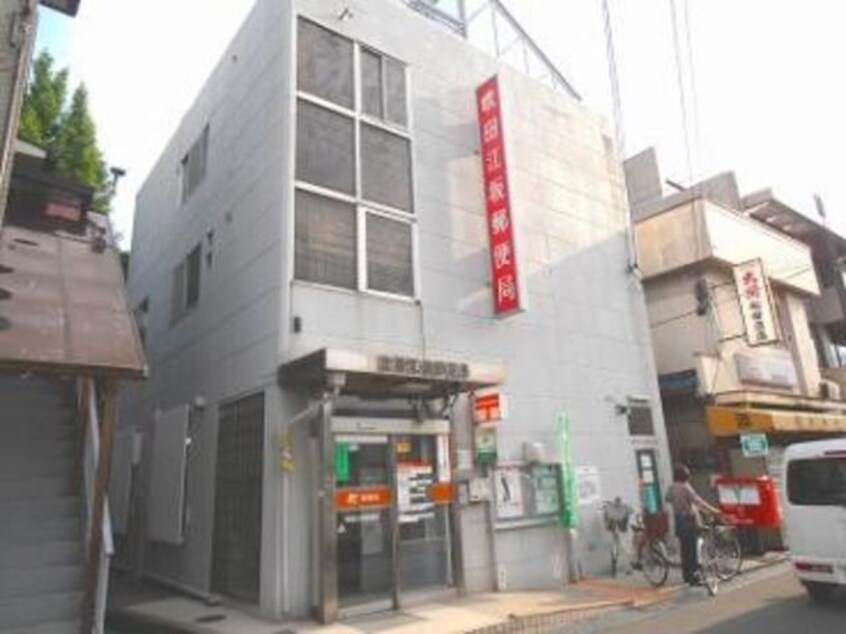 吹田江坂郵便局(郵便局)まで709m※吹田江坂郵便局 アスティオン江坂