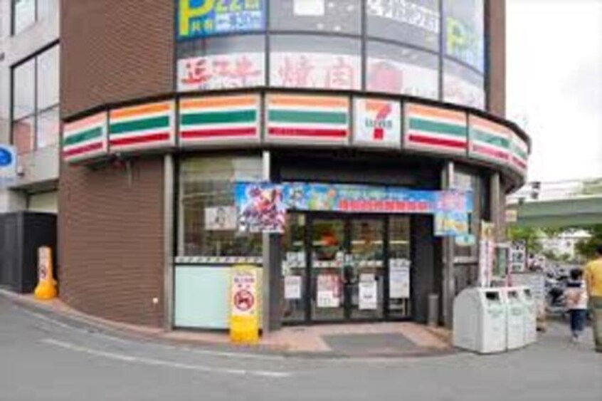 セブンイレブン吹田竹見台店(コンビニ)まで879m※セブンイレブン吹田竹見台店 ブランズ千里桃山台