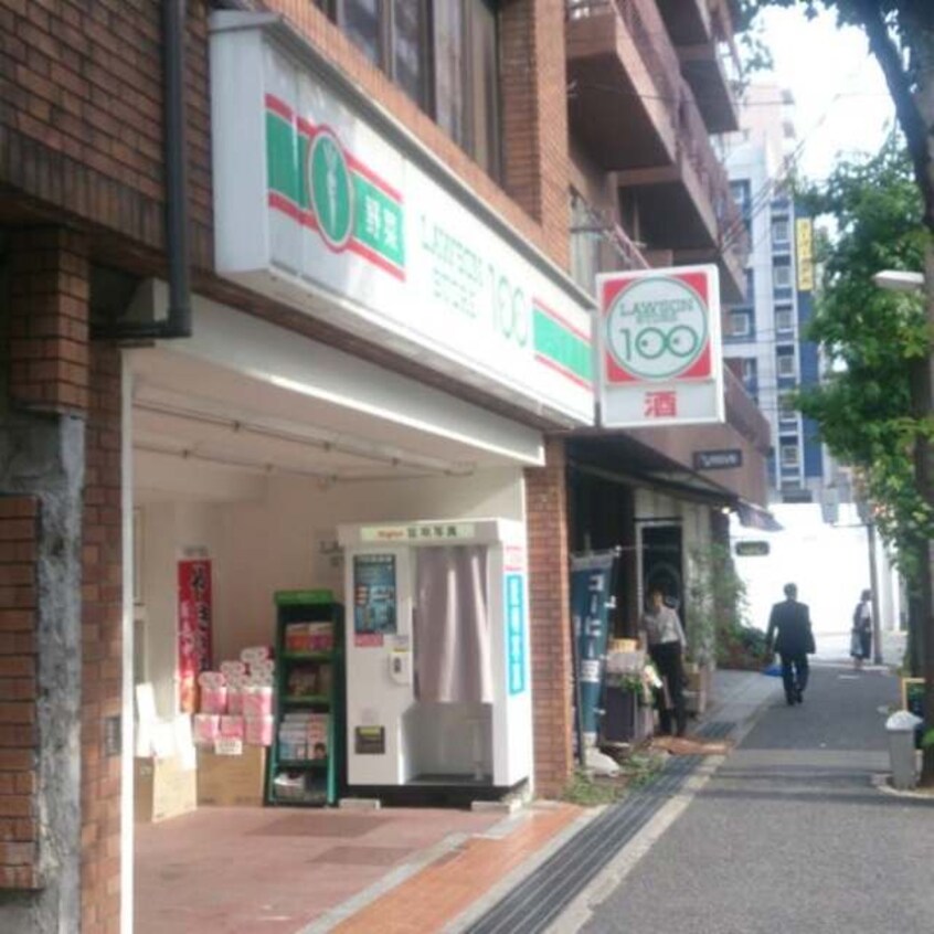 ローソンストア100吹田江の木町店(コンビニ)まで876m※ローソンストア100吹田江の木町店 プルミエール江坂