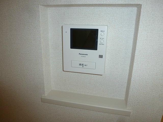 105号室のお部屋です タッセル