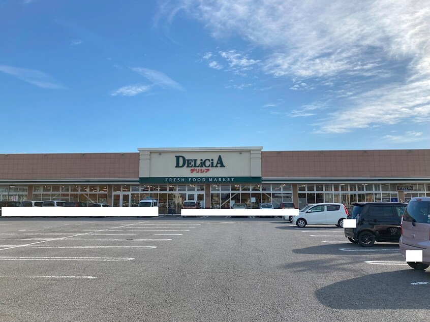 デリシア篠ﾉ井東店(スーパー)まで881m ローズコート・カノン