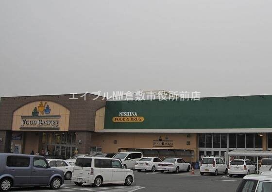 ニシナフードバスケット児島柳田店(スーパー)まで906m クレストⅠ