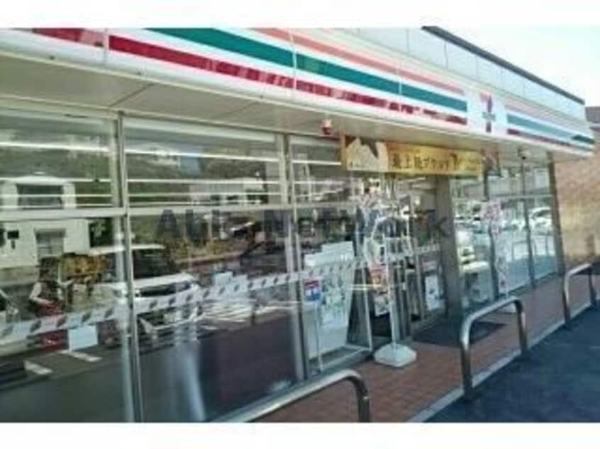 セブンイレブン佐々須崎免店(コンビニ)まで1061m サニーハイツふじA