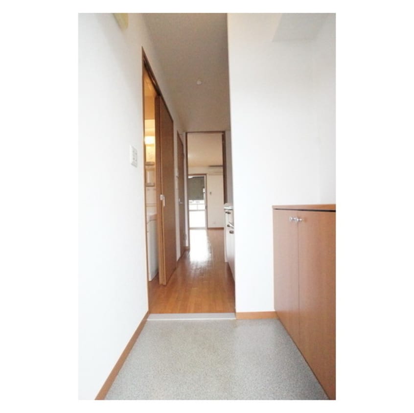 玄関から続くキッチンスペース メルべーユ文京Ｂ棟