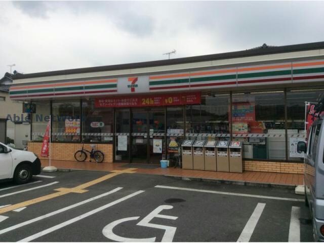 セブンイレブン久喜東鷲宮駅前店(コンビニ)まで990m メゾン・ラフォーレ