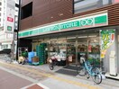 ローソンストア100関目高殿店(コンビニ)まで115m 関目タウンビル