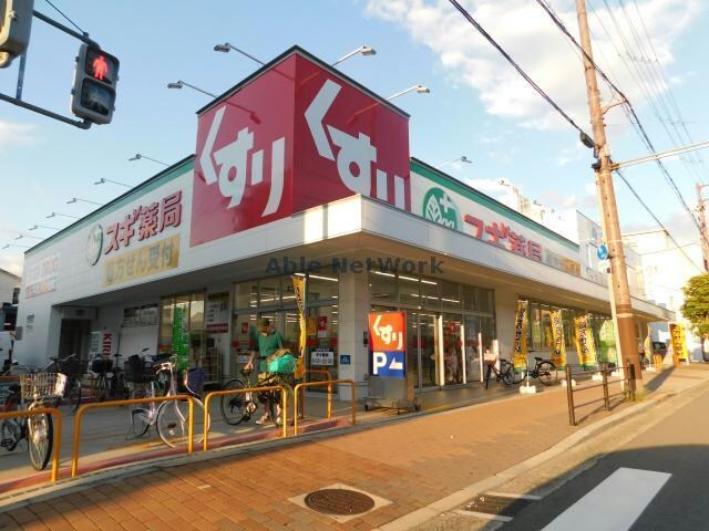 スギ薬局生江店(ドラッグストア)まで1033m パレ・ドゥ・ナカミヤ