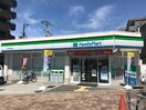 ファミリーマート関目高殿駅西店(コンビニ)まで302m ネクスト高殿