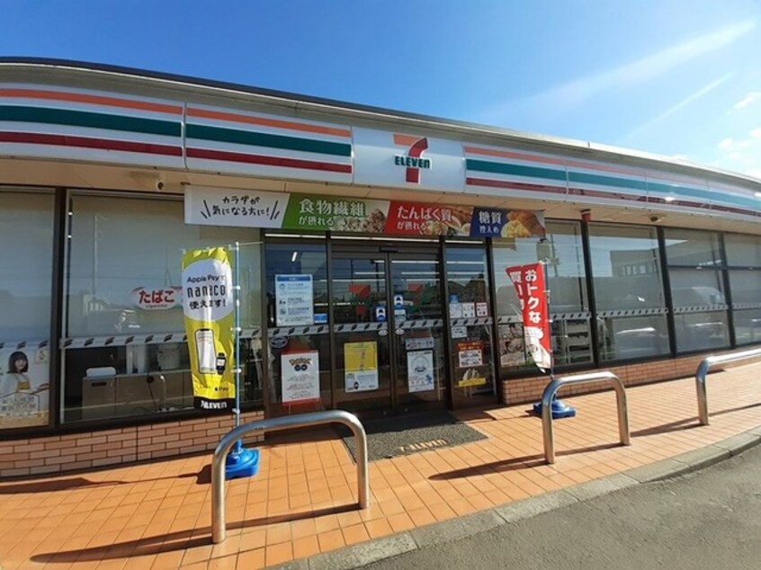 セブン-イレブン 下稲吉店まで950m カーサセレーノサウス