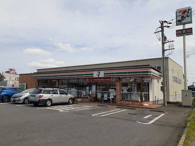 セブンイレブン谷和原インター店まで770m アヴニール・ヒルズII